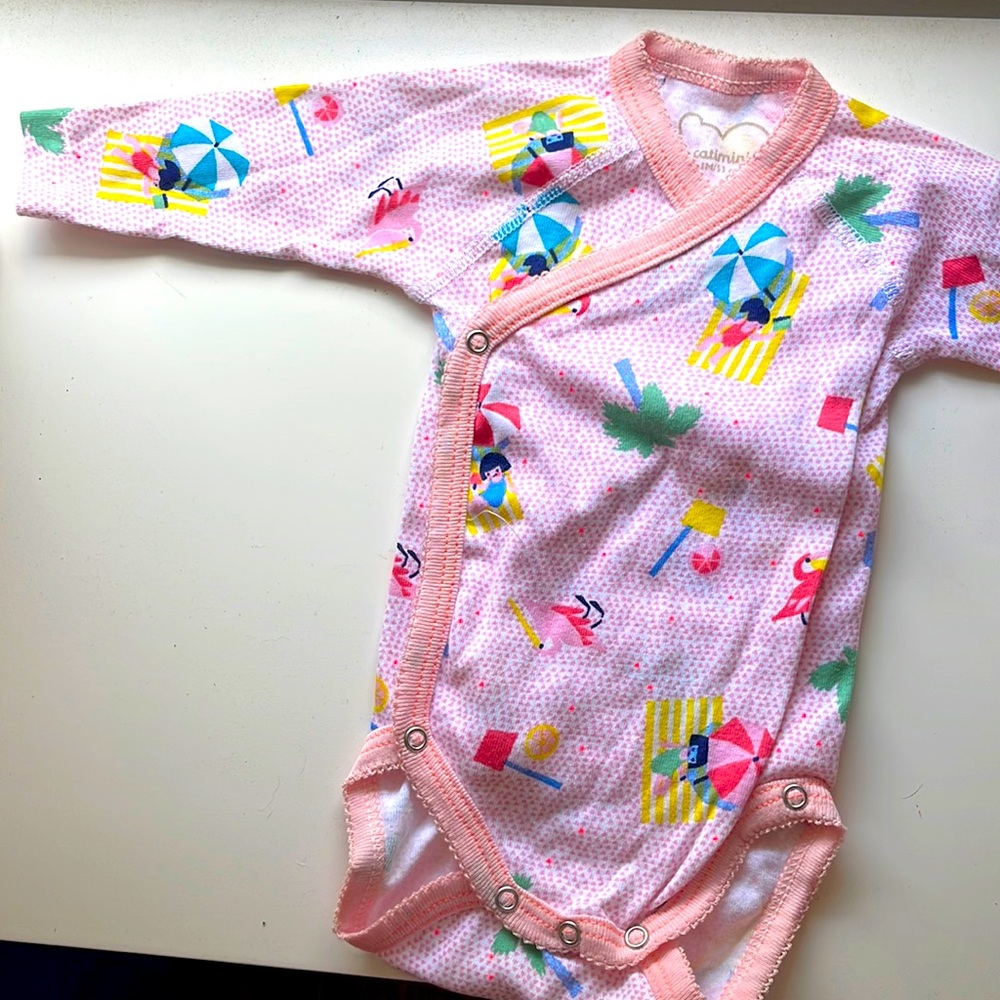 Unique newborn onsie with beach umbrellas